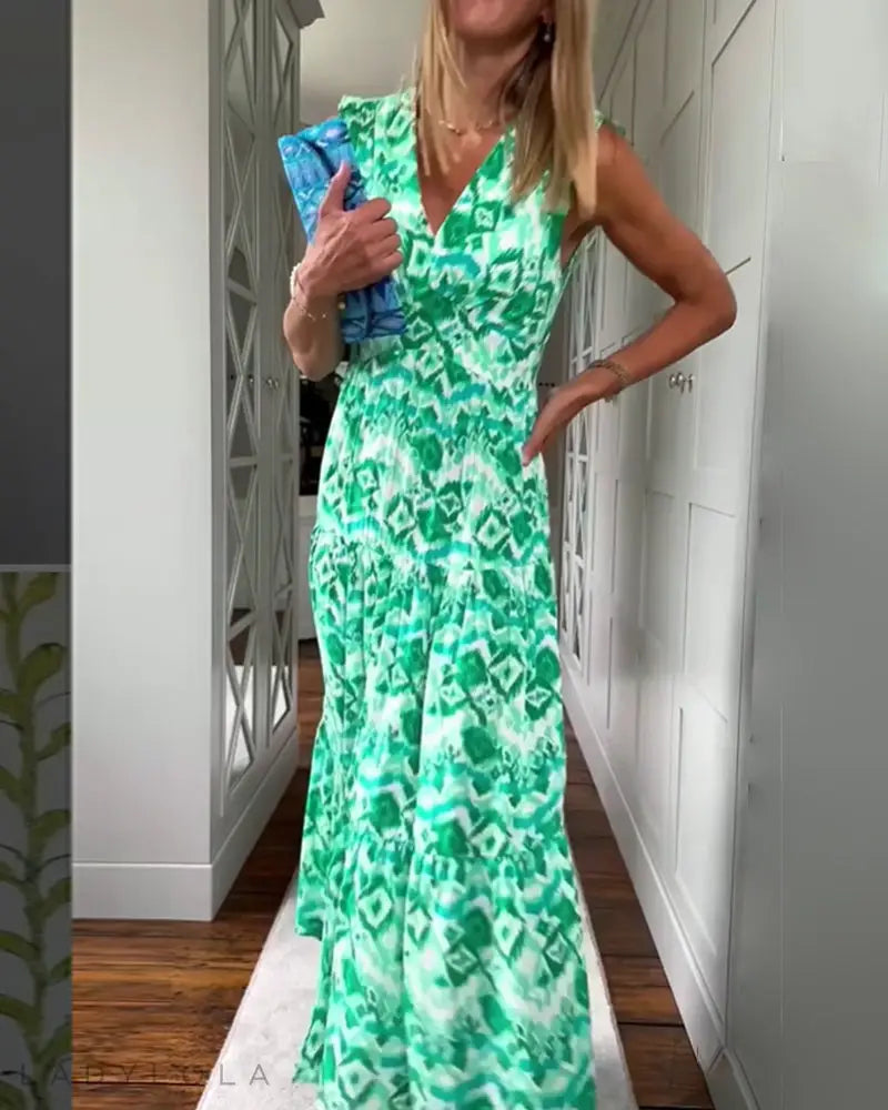 Laura | Ermeløs kjole med trykk med splitt